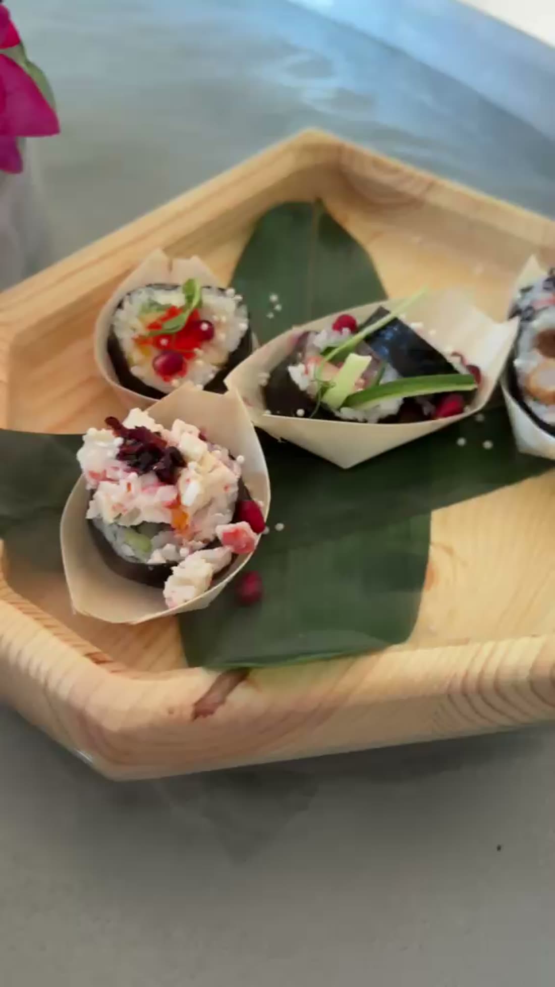 A boat carrying bite-sized food on the river
